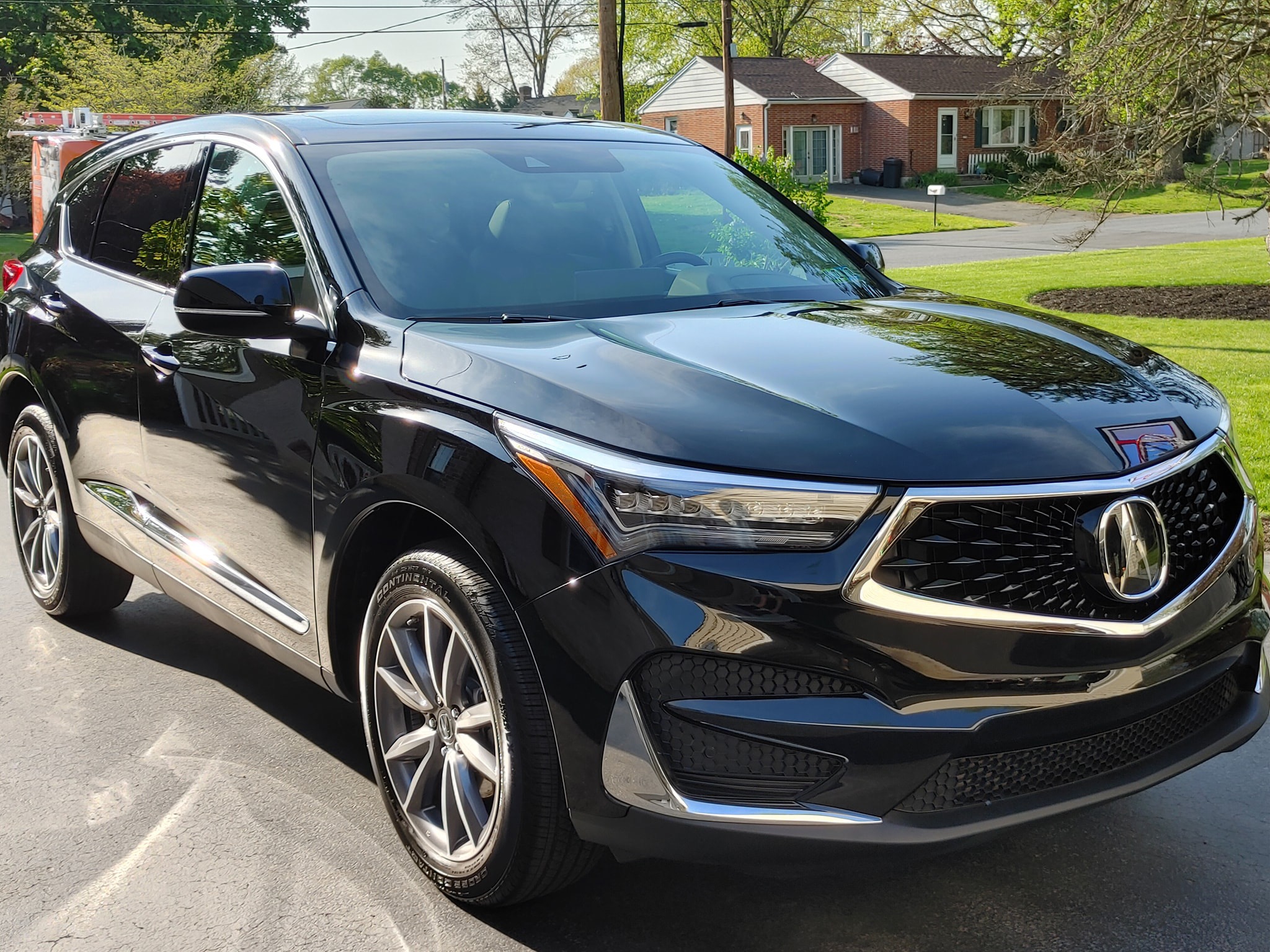 Black Acura RDX with clean showroom finish after auto detailing at Attention 2 Details in Lancaster, PA