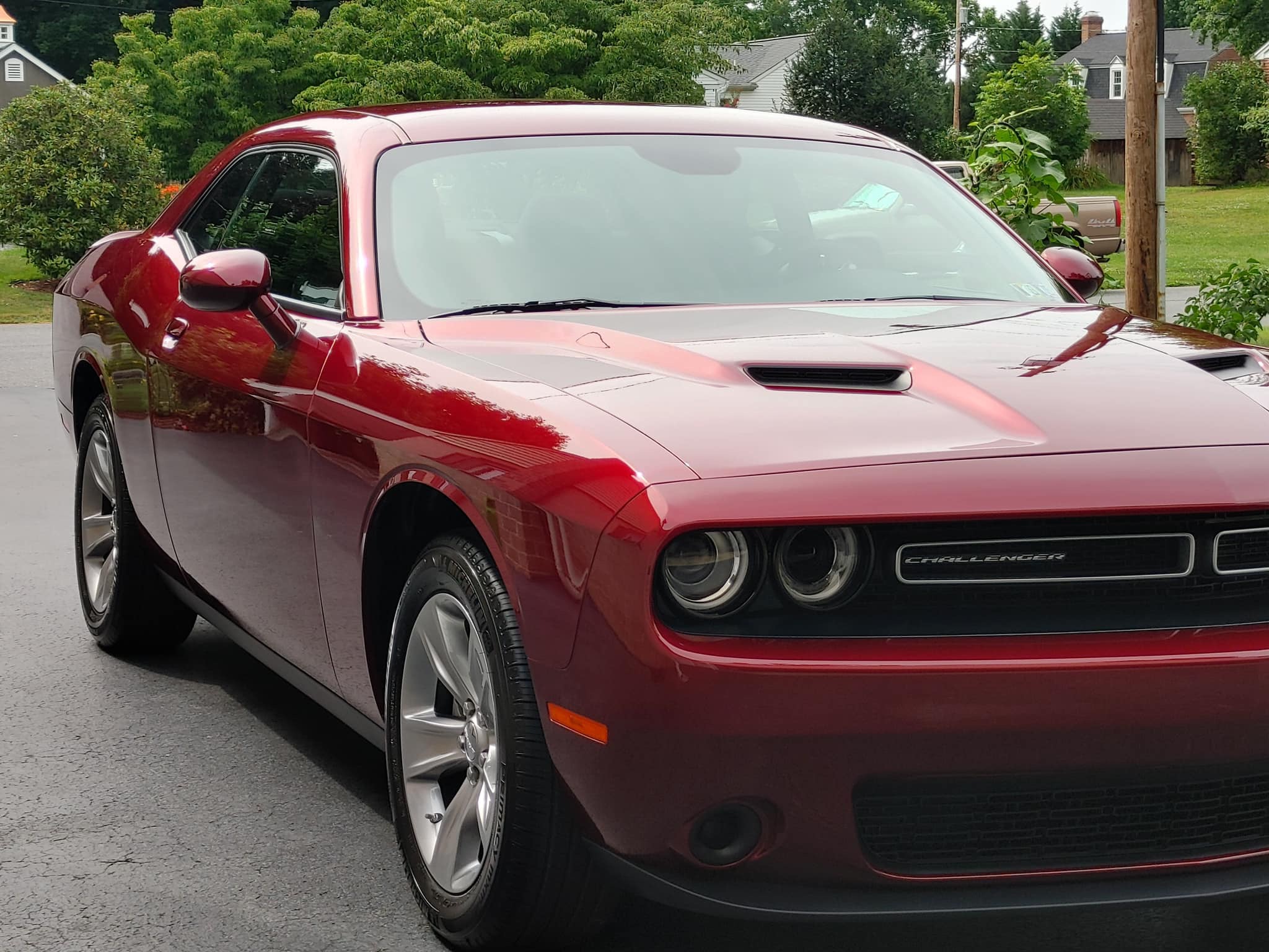 Maroon Dodge Challenger alternate angle at Attention 2 Details Lancaster PA