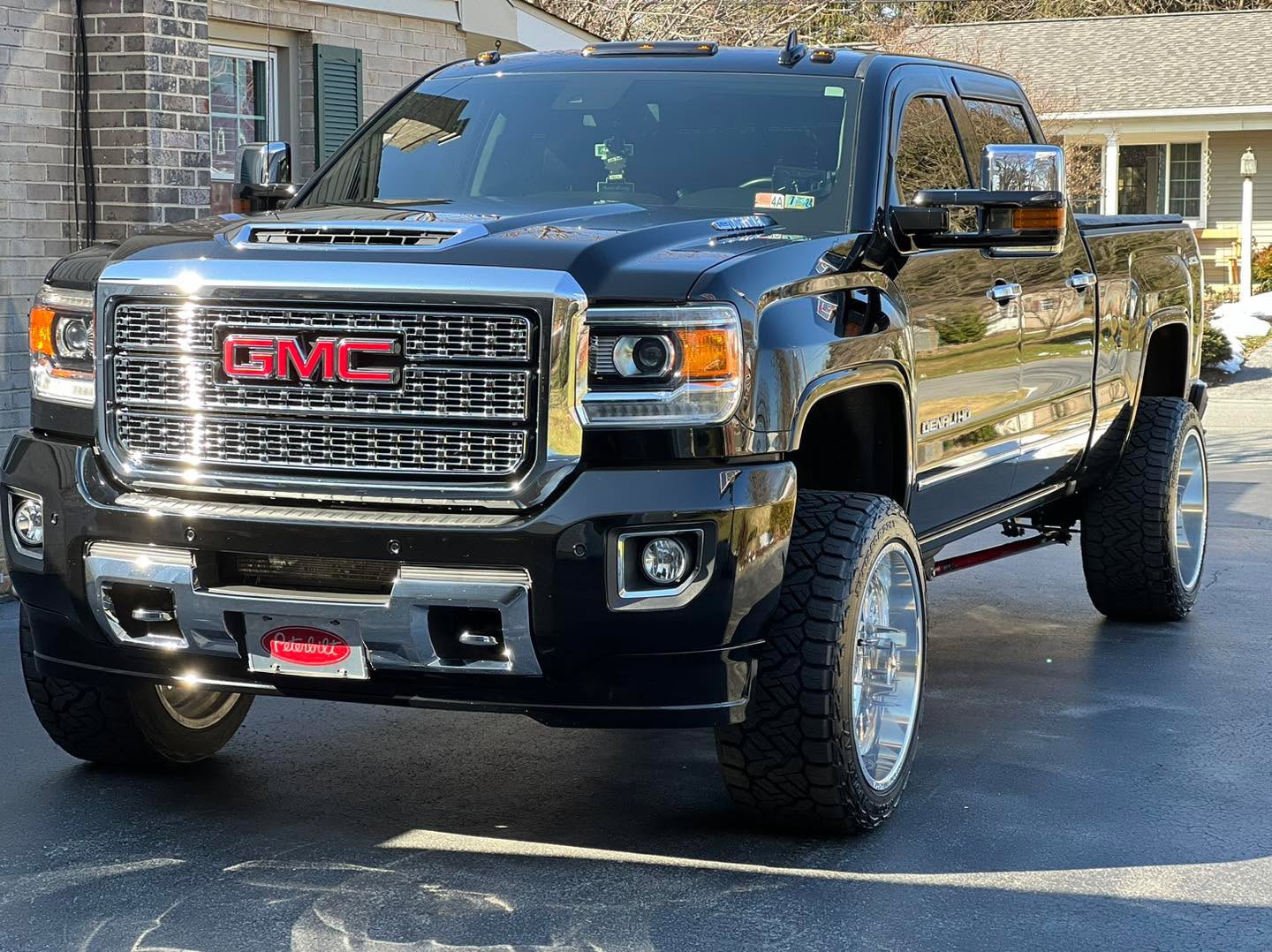 Black GMC Sierra Denali HD side profile at Attention 2 Details Lancaster PA